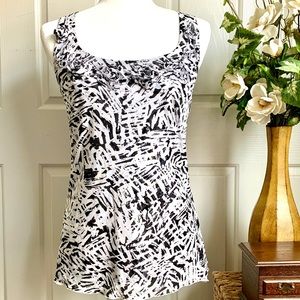 CABLE AND GAUGE SLEEVELESS BLOUSE